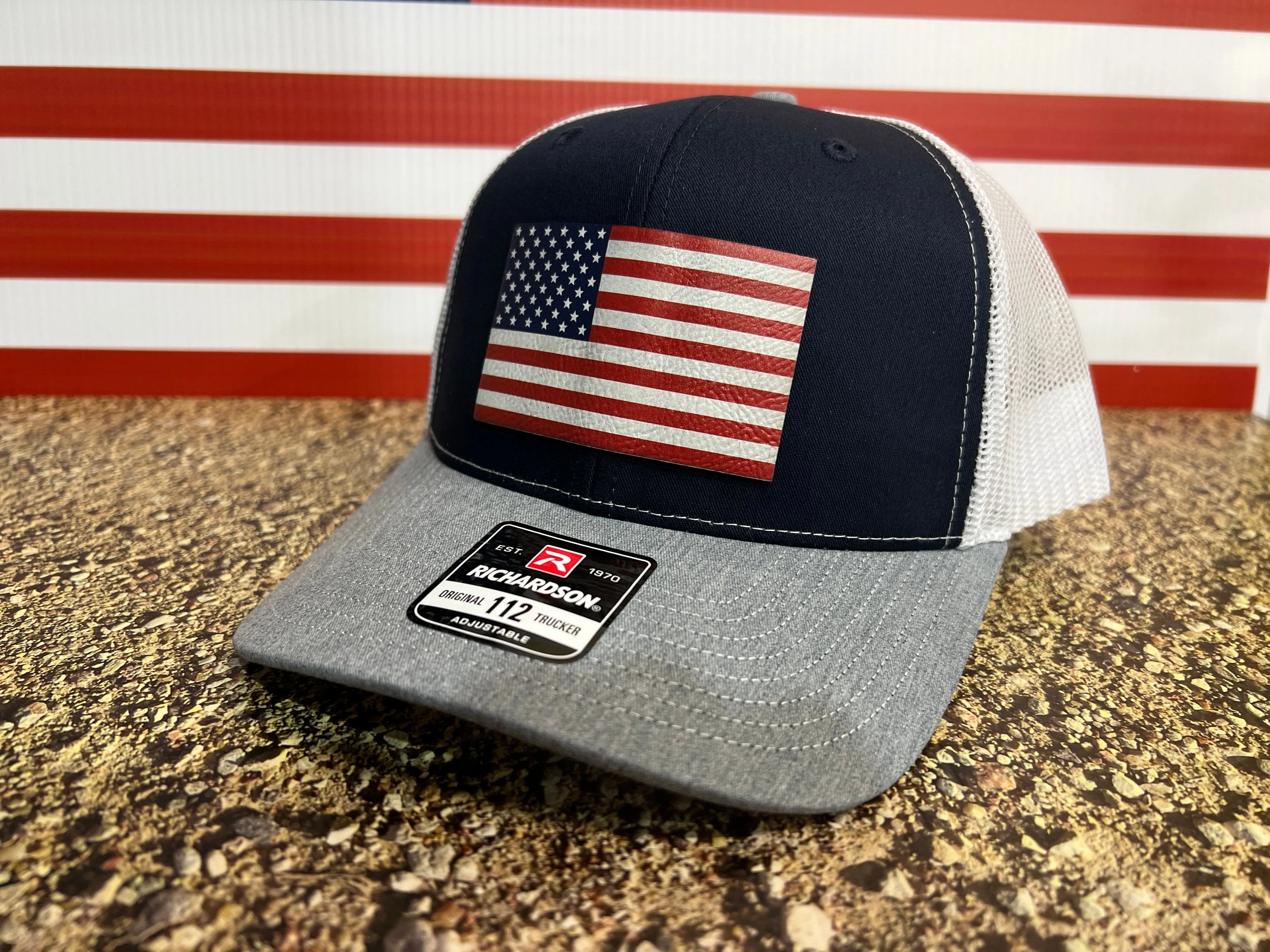 American Flag Hat UV Printed Premium Leatherette Patch on a Richardson 112 Trucker Hat.